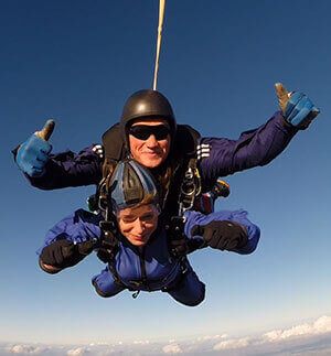 Breast cancer survivor skydives for charity