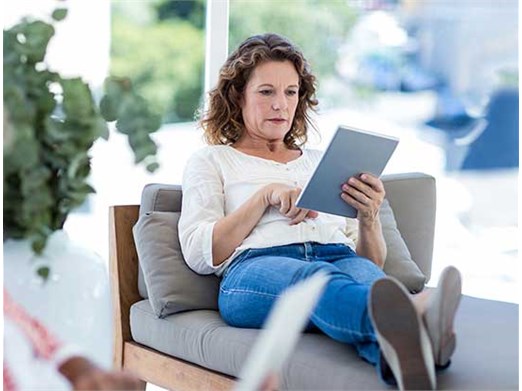 woman researching breast cancer news